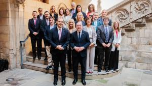 El conseller de la Presidència, Albert Dalmau, junto al delegado del Gobierno en Catalunya, Carlos Prieto, y con delegados territoriales de las dos administraciones.