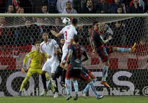 Sevilla's Adil Rami heads the ball to score against Celta Vigo