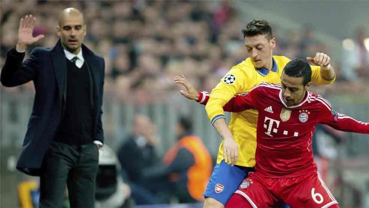 Guardiola observa a Ozil en un duelo ante el Bayern