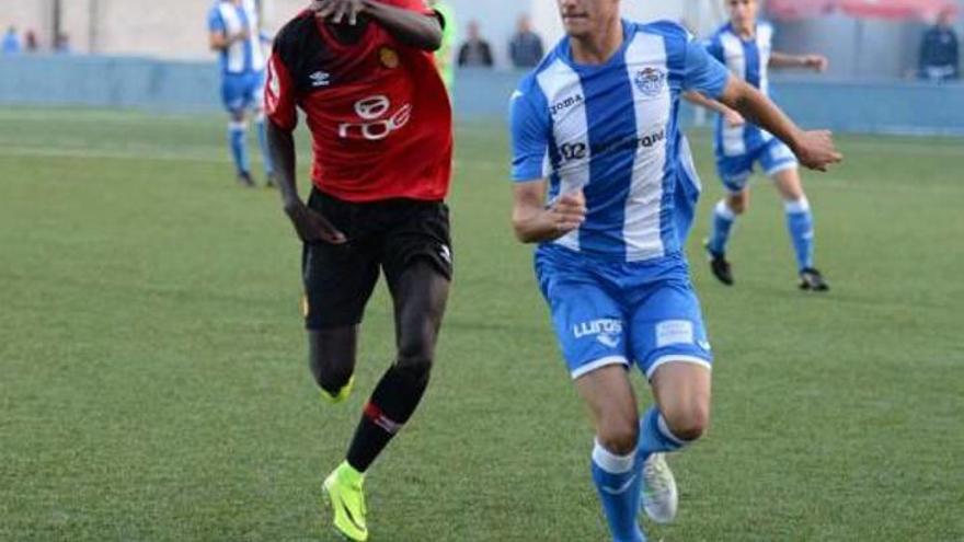 Alpha, en un partido con el Mallorca juvenil de División de Honor.