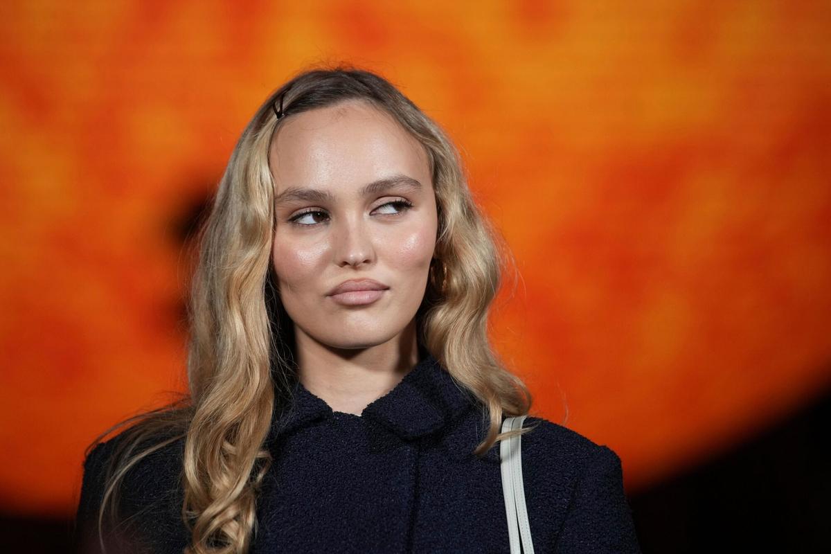 Lily-Rose Depp poses for photographers upon arrival at the Chanel Spring/Summer 2026 collection presented in Paris, Monday, Oct. 6, 2025. (AP Photo/Christophe Ena). EDITORIAL USE ONLY/ONLY ITALY AND SPAIN