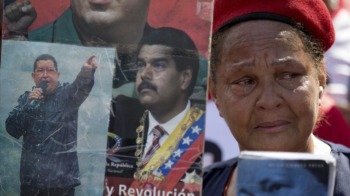 mbenach42532358 in this march 15 2018 photo a supporter of the late venezu180318192546 mbenach42532358 in this march 15 2018 photo a supporter of the late venezu180318192546