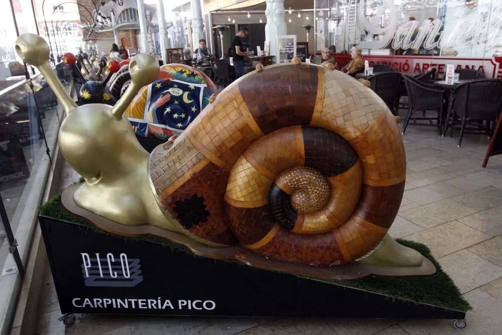 Exposición de caracoles gigantes en el mercado de Colón