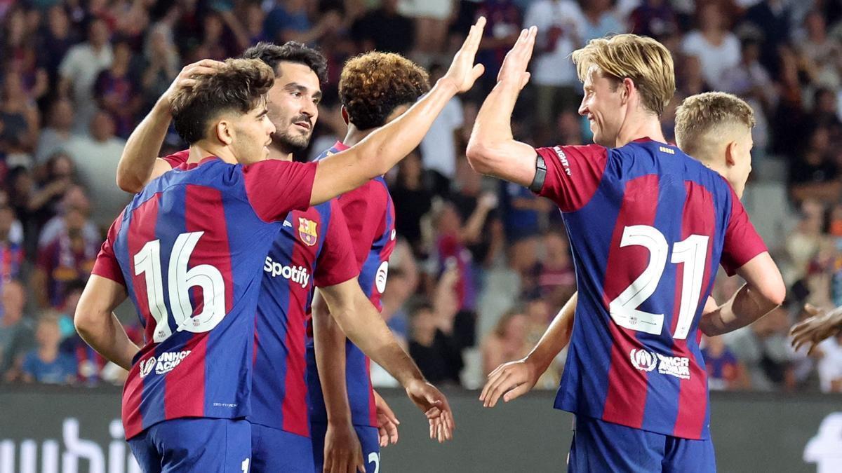 Los jugadores del Barcelona celebran un gol al Tottenham.