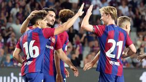 Los jugadores del Barcelona celebran un gol al Tottenham.