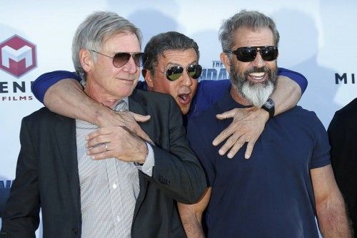 Cast members Harrison Ford, Sylvester Stallone, Mel Gibson pose during a photocall on the Croisette  to promote the film "The Expendables 3" during the 67th Cannes Film Festival in Cannes