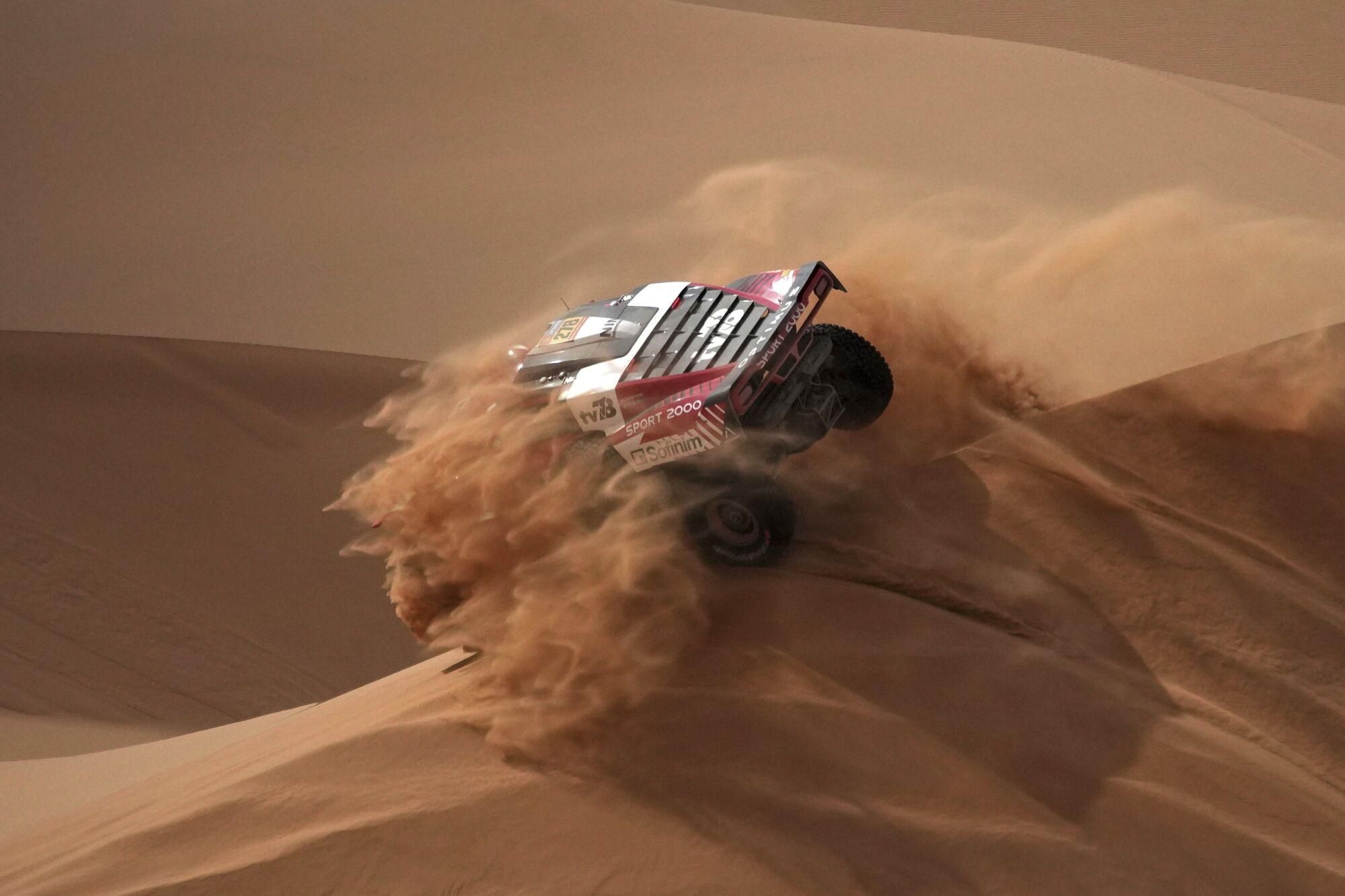 Driver Simon Vitse and co-driver Max Delfino compete during the seventh stage of the Dakar Rally with start and finish in Al Duwadimi, Saudi Arabia, Sunday, Jan. 12, 2025. (AP Photo/Christophe Ena) Associated Press/LaPresse. EDITORIAL USE ONLY/ONLY ITALY AND SPAIN