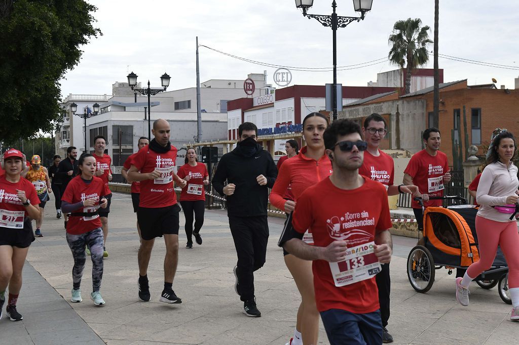 La XIII carrera solidaria Corriendo con Assido, en imágenes