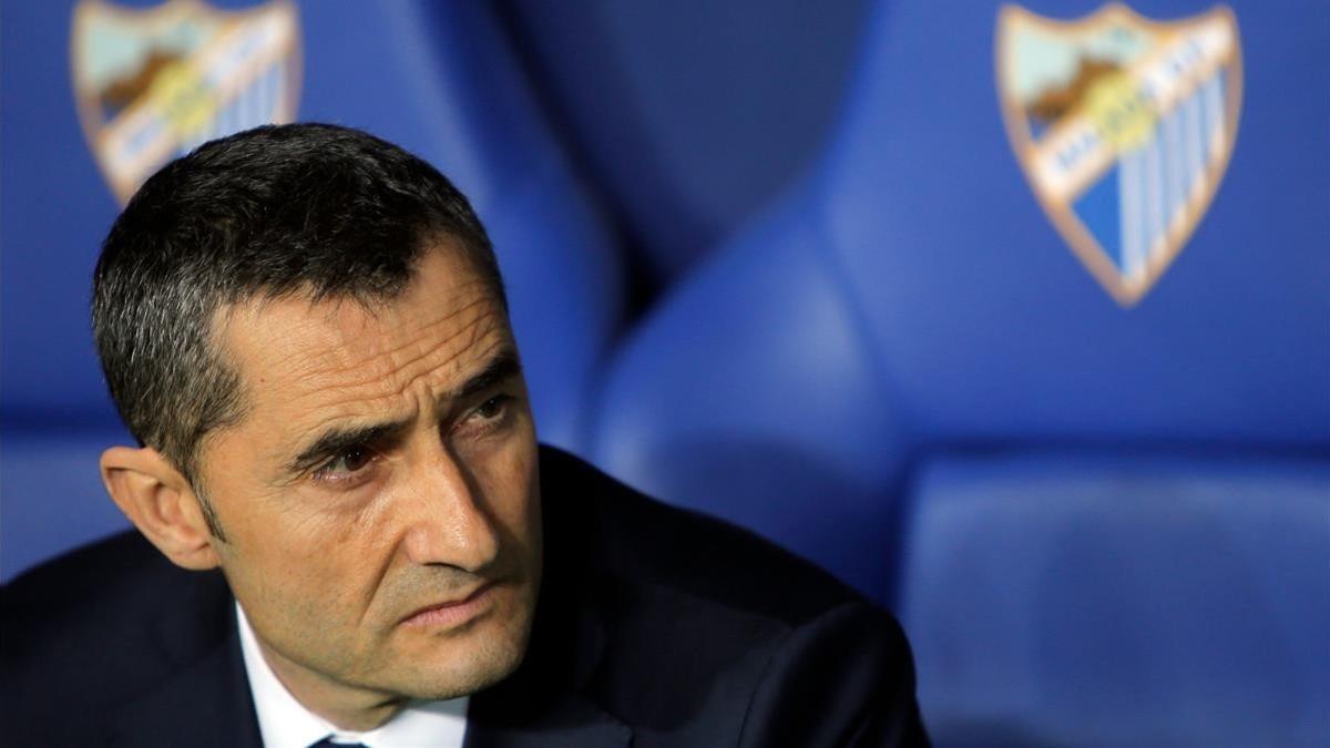 rpaniagua42468287 barcelona s spanish coach ernesto valverde sits on the bench180310223509