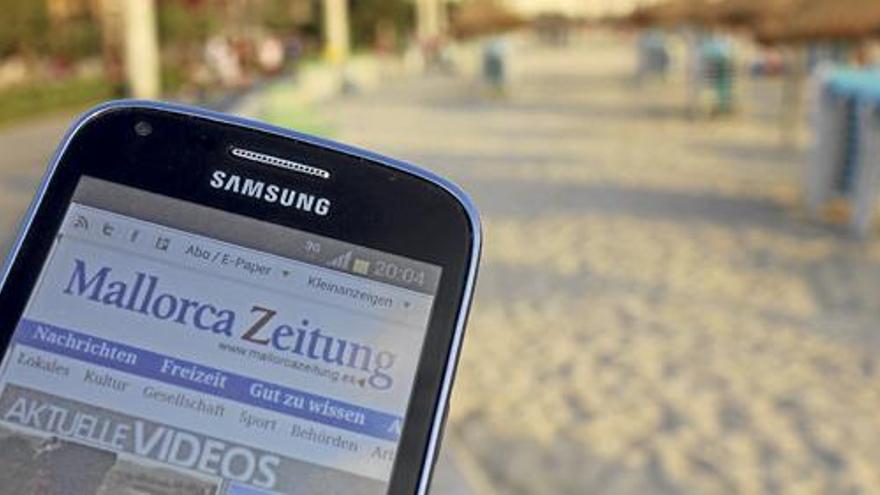 Die Mallorca Zeitung auf dem Smartphone lesen - an der Playa ist der W-Lan-Zugang kostenlos
