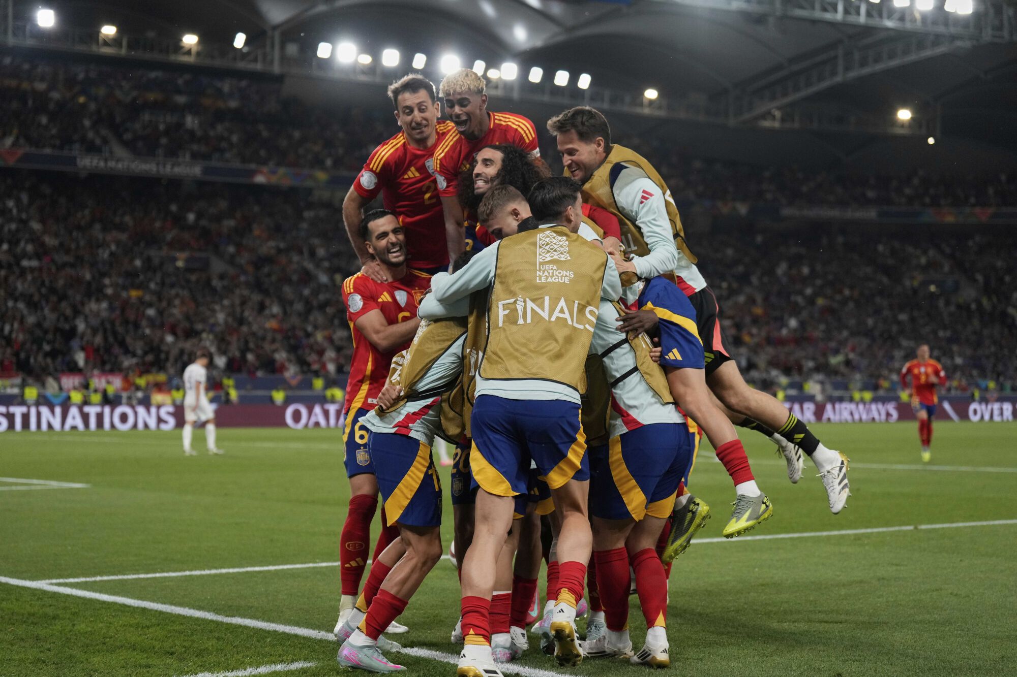 Spanish players celebrate after a goal during the Nations League semifinal soccer match between Spain and France in Stuttgart, Germany, Thursday, June 5, 2025. (AP Photo/Matthias Schrader). EDITORIAL USE ONLY/ONLY ITALY AND SPAIN
