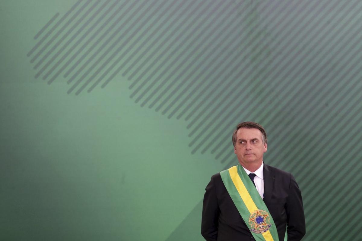 Brazil s President Jair Bolsonaro looks on as he presents his cabinet at the Planalto Presidential palace  in Brasilia  Brazil  Tuesday  January 1  2019   AP Photo Eraldo Peres