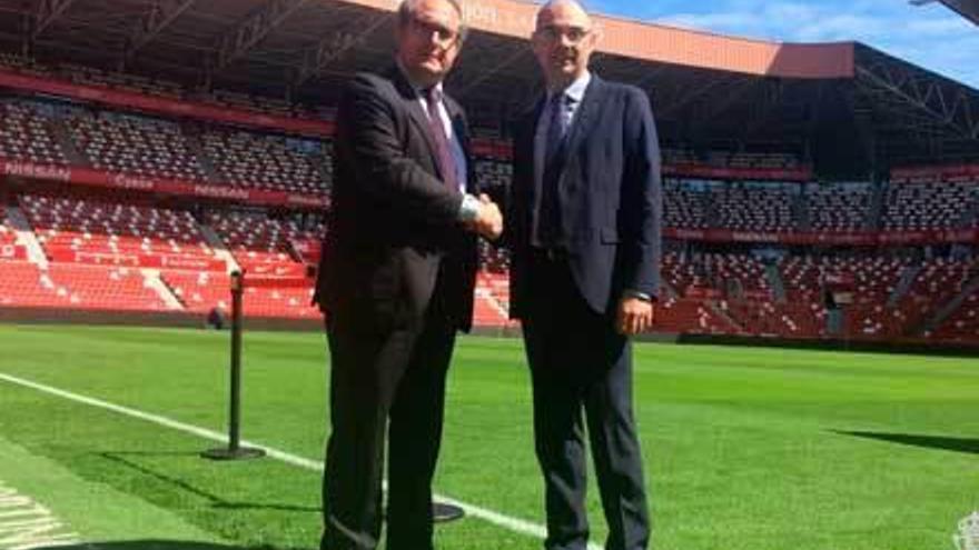 Germán Robles junto a Jorge Coll, director de ESBS, en El Molinón.