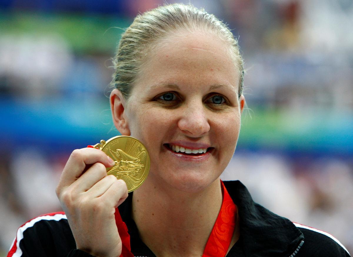 FILE PHOTO: Kirsty Coventry of Zimbabwe celebrates after winning the women's 200m backstroke swimming final at the Beijing 2008 Olympic Games