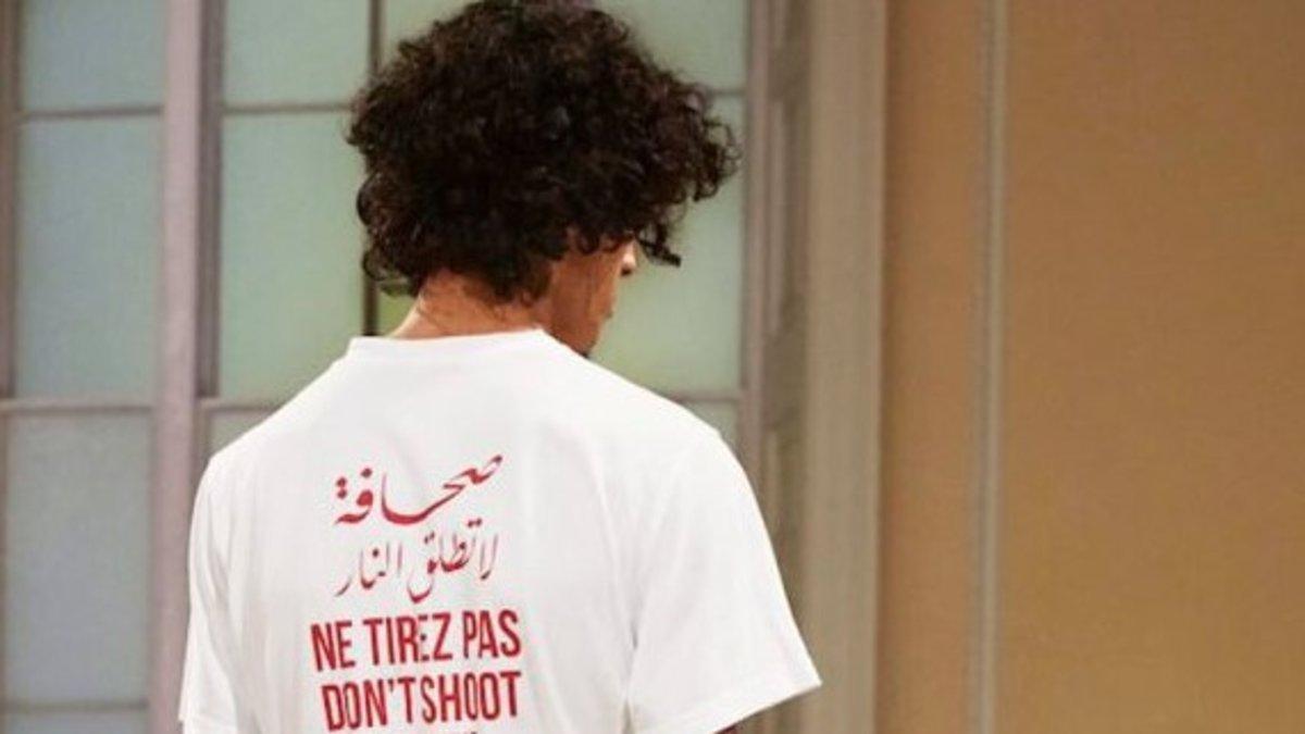 Camiseta con el texto 'No dispare' en varios idiomas