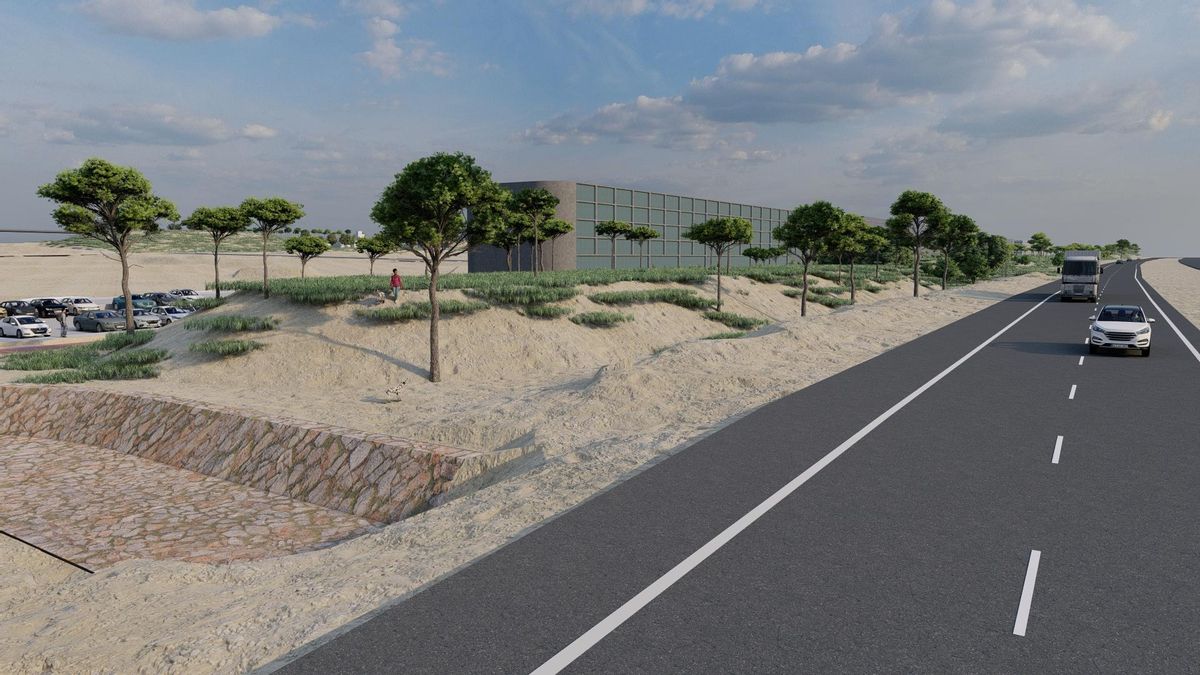 El área empresarial desde el vial, con uno de los espacios dedicados a aparcamiento