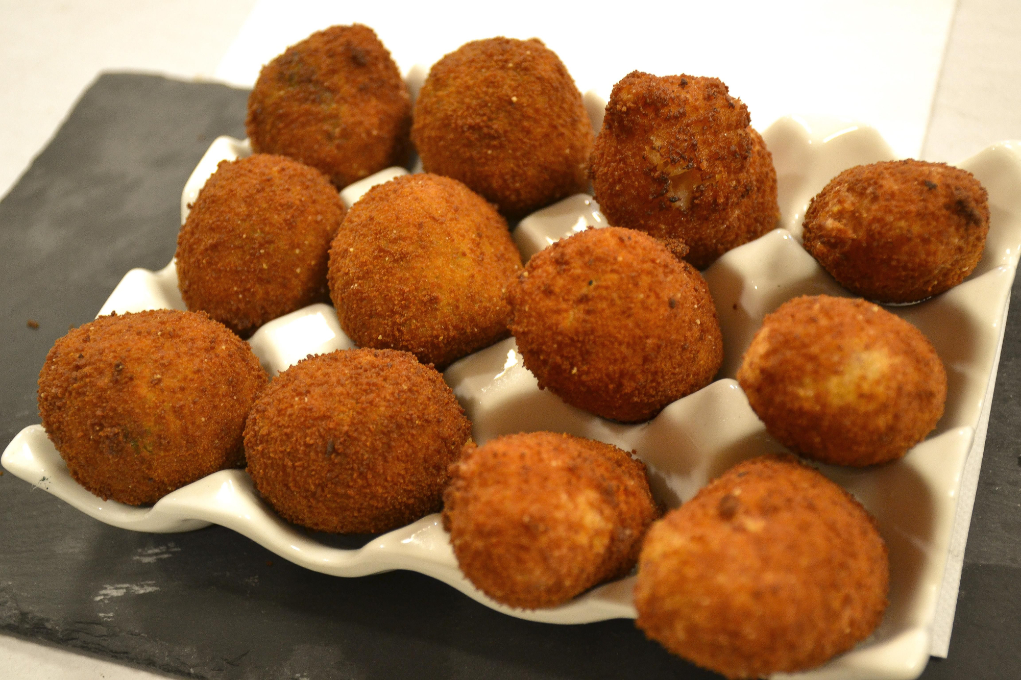 Croquetas de jamón y otras de queso y espinacas, una de las especialidades de Casa Vicentón.