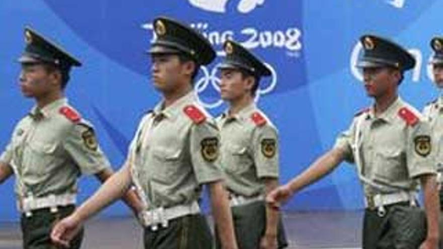 La policía china golpea a varios periodistas y elimina material sobre un supuesto atentado