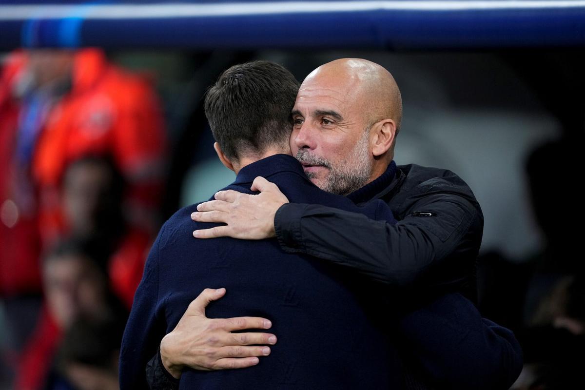 Pep Guardiola con Xabi Alonso, en el Bernabéu el pasado mes de diciembre.