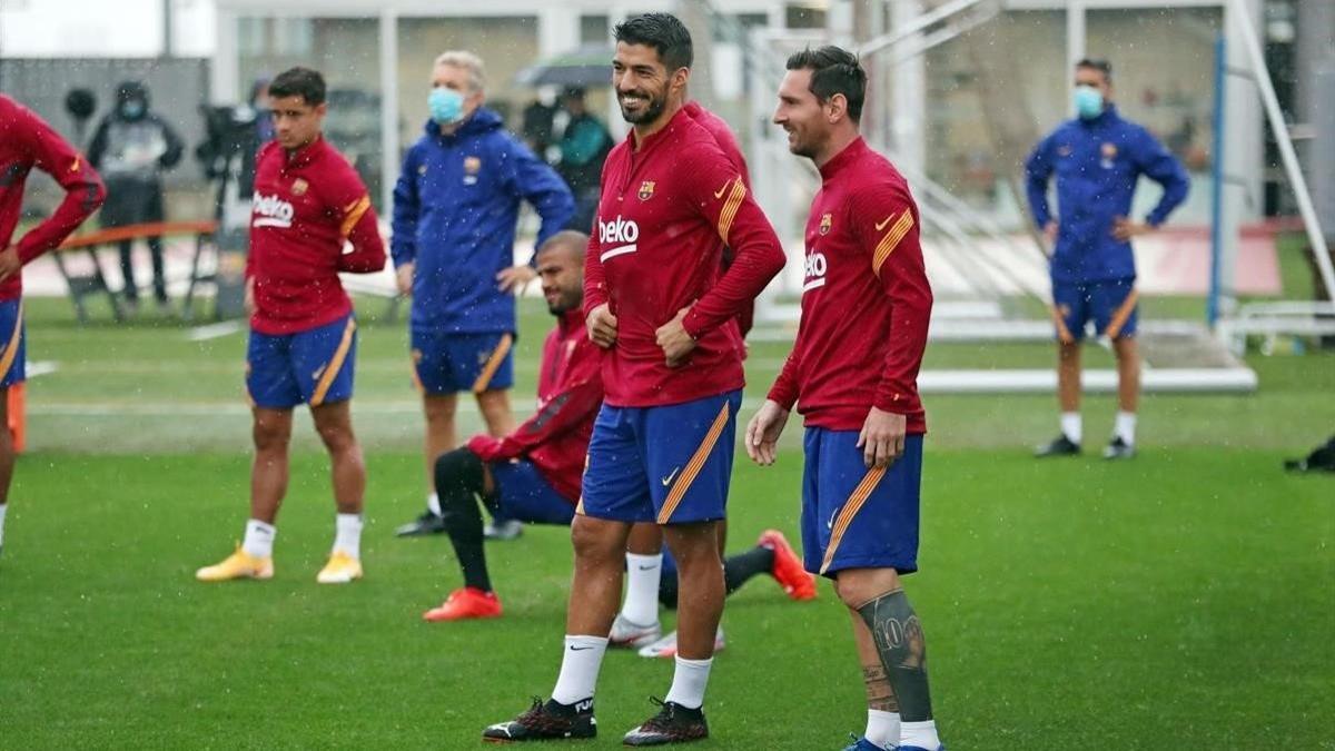 Suárez y Messi, en el entrenamiento de este miércoles en la ciudad deportiva del Barça.