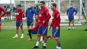 Suárez y Messi, en el entrenamiento de este miércoles en la ciudad deportiva del Barça.