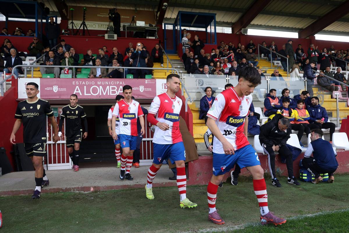 Las imágenes del duelo trascendental entre el Arosa y el Compostela Las imágenes del duelo trascendental entre el Arosa y el Compostela