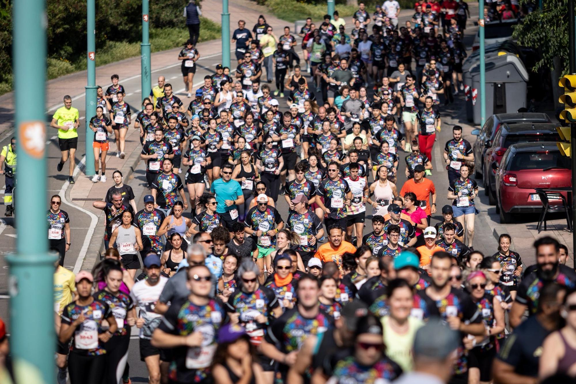 En imágenes | La carrera Ponle Freno sca a la calle a miles de personas en Zaragoza