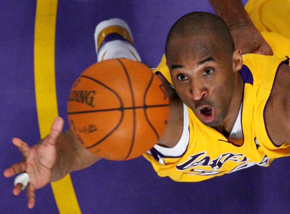 FILE PHOTO: Los Angeles Lakers Bryant jumps for ...