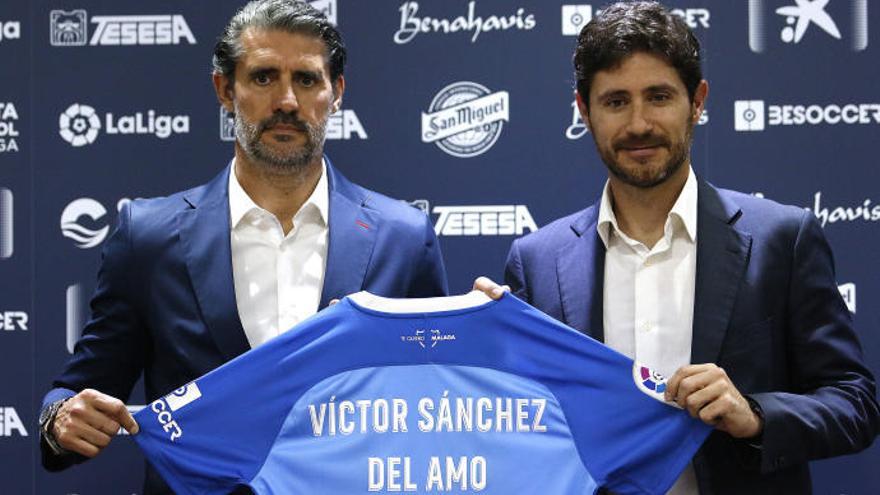 Víctor y Caminero, durante la presentación del técnico