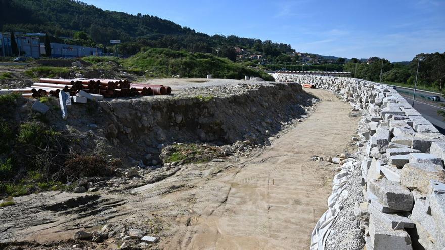 Aspecto del estado actual de las obras, con un muro hacia la autopista.