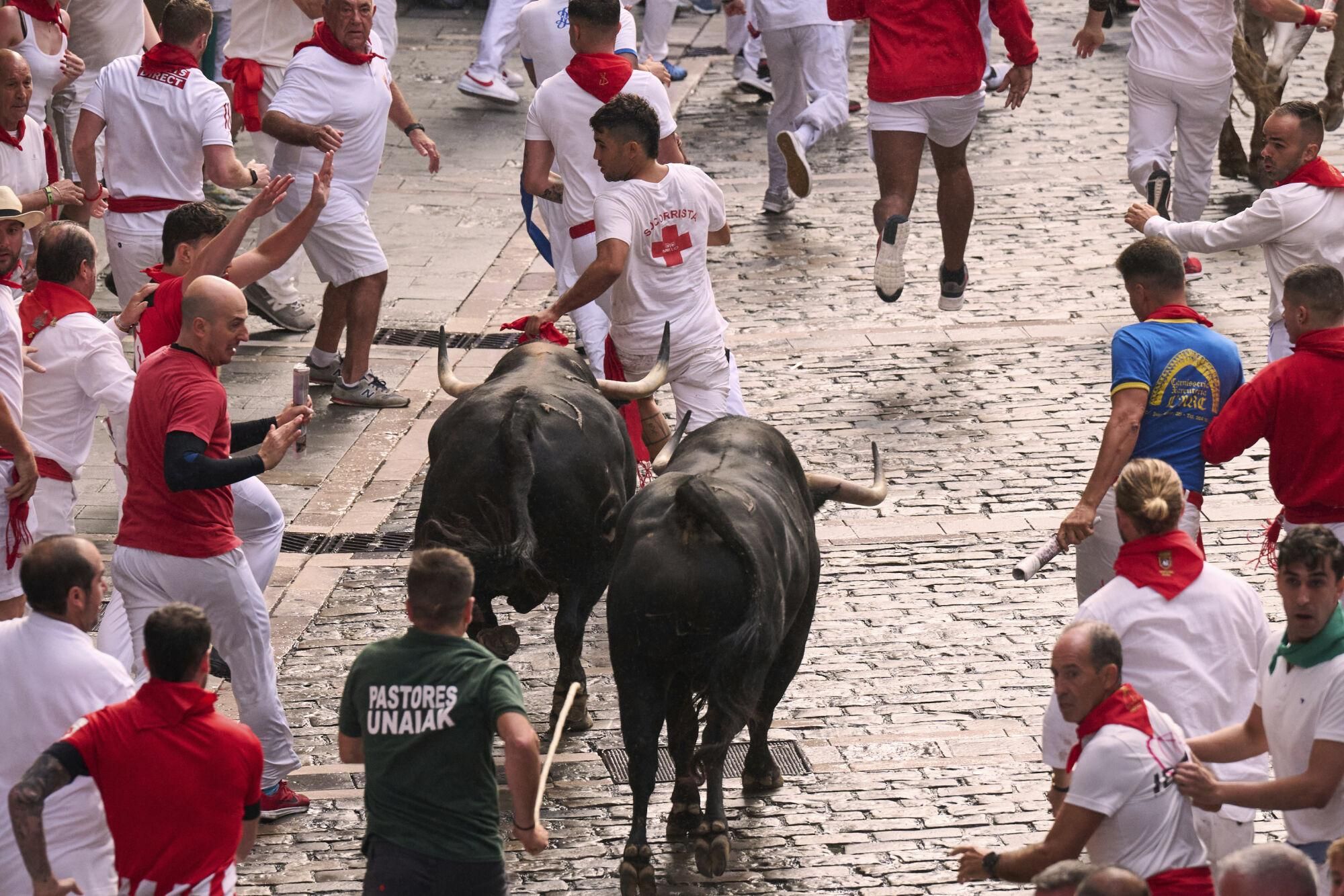 El primer encierro de los Sanfermines 2025, en imágenes.