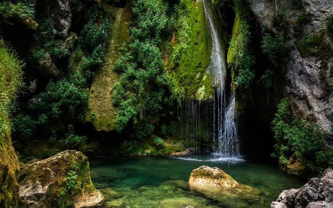 Beautiful cascades Birth of the Urederra river in Navarra Spain