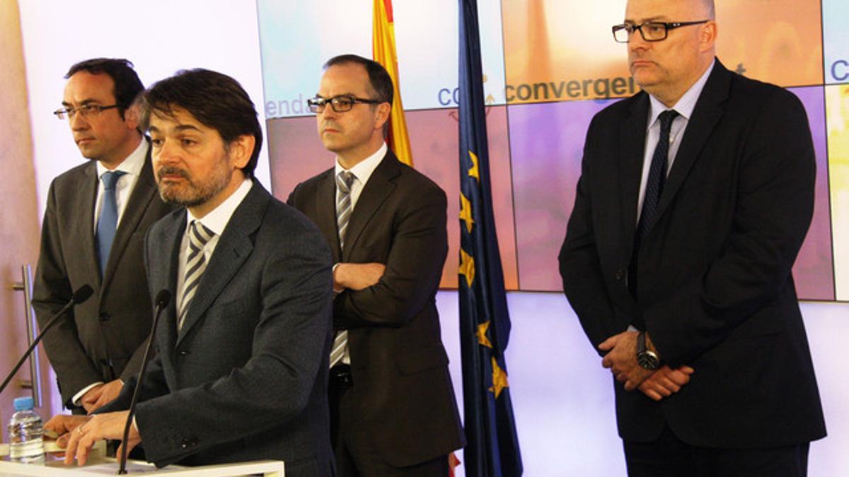 Oriol Pujol flanqueado por Josep Rull, Jordi Turull y Lluís Corominas.