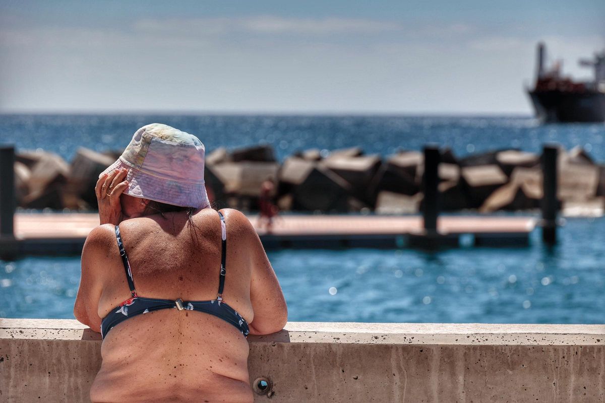 One of the residents of Santa Cruz enjoys the sea views.