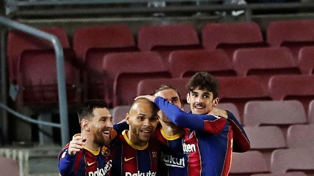 Messi, Braithwaite, Griezmann y Trincao festejan el gol de la clasificación. |  // EFE