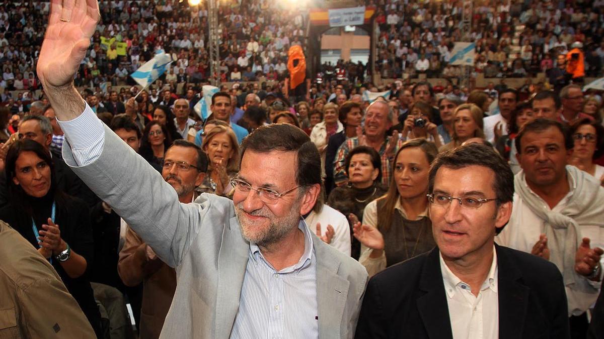 Imagen de archivo de Mariano Rajoy y Alberto Núñez-Feijóo en un acto celebrado en 2012.