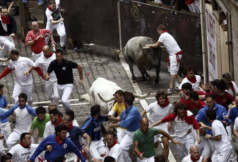 Fotogalería del quinto encierro de San Fermín