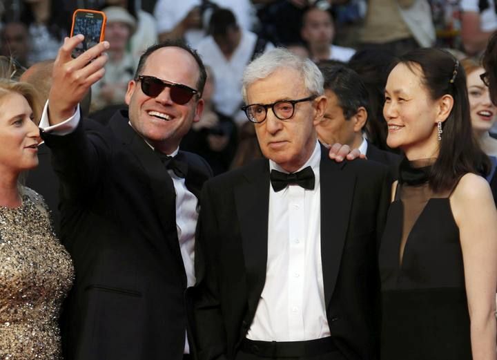 Director Woody Allen and his wife Soon-Yi Previn arrive on the red carpet for the screening of the film "Irrational Man" out of competition at the 68th Cannes Film Festival in Canne