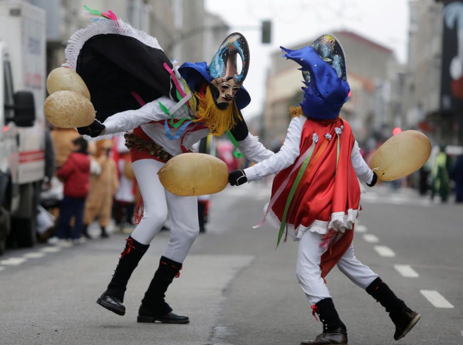 Revellers strike each other with pig bladders on ...