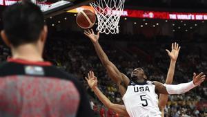 undefined49812880 donovan mitchell of the us goes to the basket during the bas190911150443