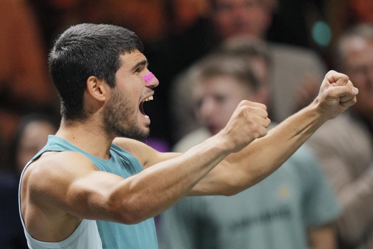 Spain's Carlos Alcaraz celebrates as he won the final match against Australia's Alex de Minaur at the ABN AMRO Tennis Tournament in Rotterdam, Netherlands, Sunday, Feb. 9, 2025. (AP Photo/Peter Dejong)