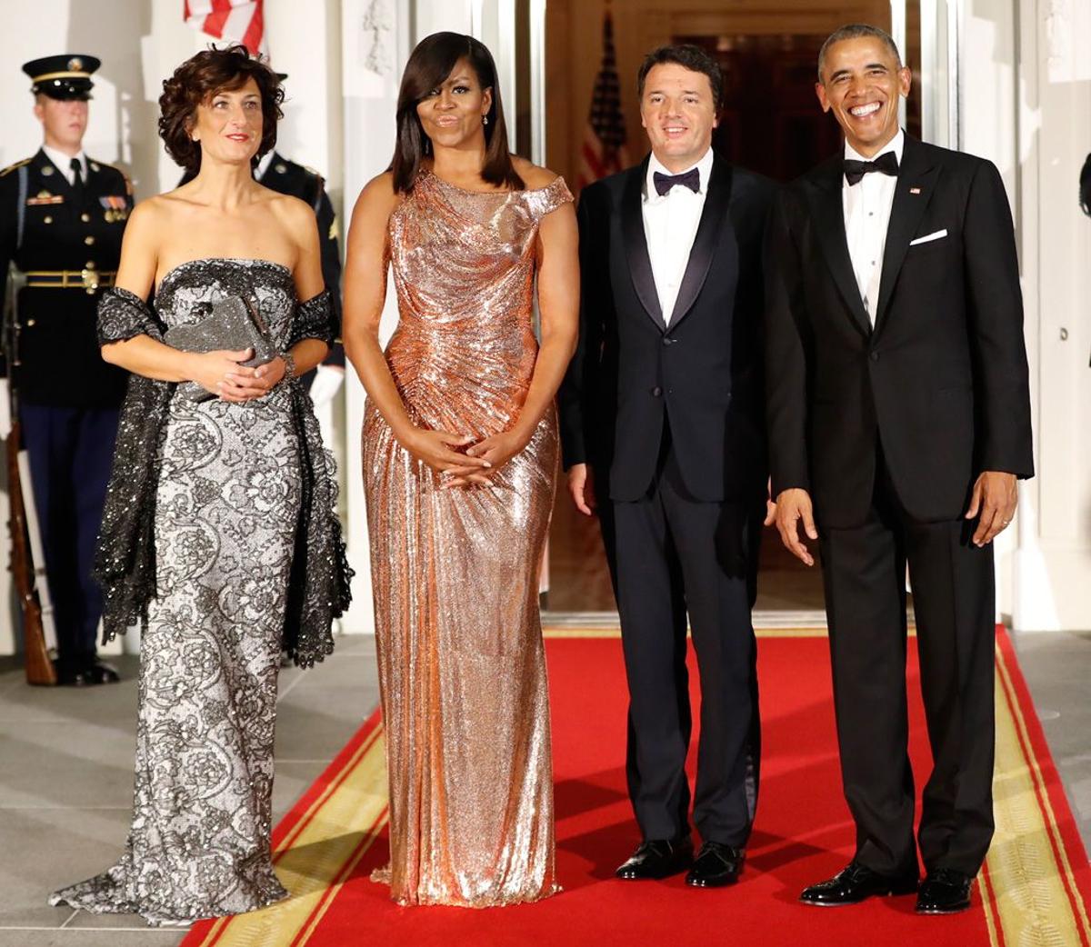 Michelle de Versace y Barack Obama junto al primer ministro italiano
