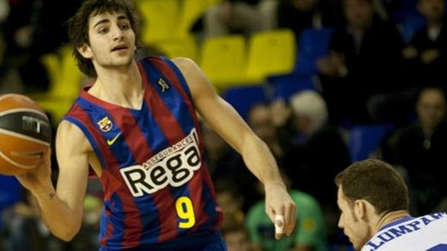 Ricky Rubio busca una asistencia.