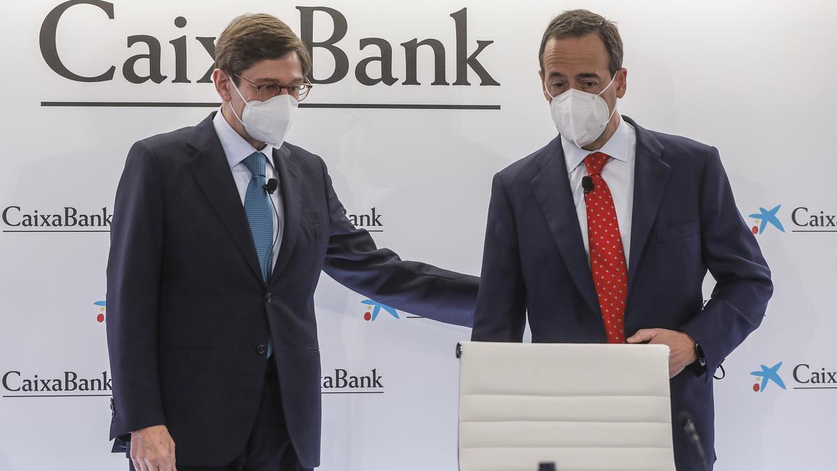 El presidente de CaixaBank, José Ignacio Goirigolzarri, y el consejero delegado de la entidad, Gonzalo Gortázar, durante una rueda de prensa en la Sede social de CaixaBank, en la Sede social de CaixaBank, Valencia, Comunidad Valenciana