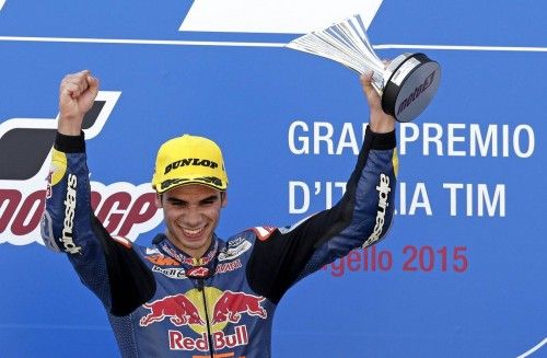 KTM Moto3 rider Oliveira of Portugal holds up the trophy on the podium after winning the Italian Grand Prix at the Mugello circuit