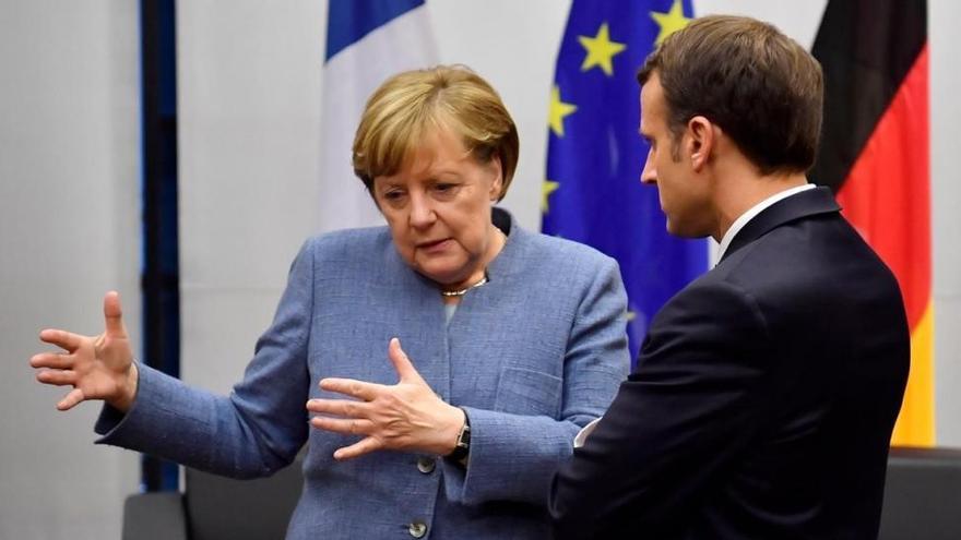 Merkel llama a implementar con &quot;seriedad&quot; el Acuerdo de París mientras que Alemania no limita el carbón