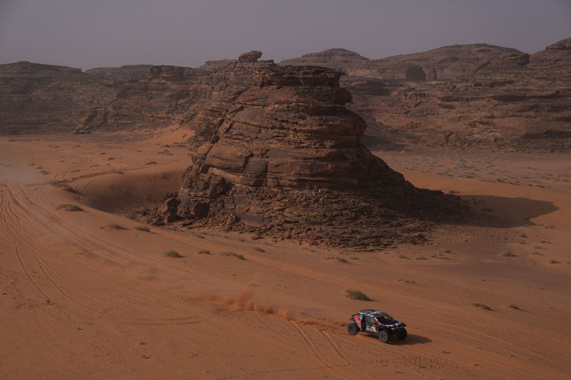 Driver Sebastien Loeb and co-driver Edouard Boulanger compete during the third stage of the Dakar Rally with a start and finish in Alula, Saudi Arabia, Tuesday, Jan. 6, 2026. (AP Photo/Thibault Camus)