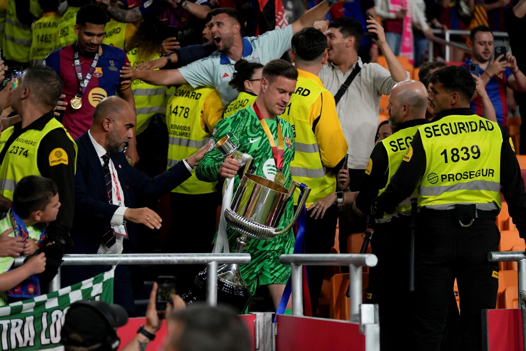 Marc-Andre ter Stegen of FC Barcelona receives the trophy during the Spanish Cup, Copa del Rey, Final football match played between FC Barcelona and Real Madrid at La Cartuja Stadium on April 26, 2025 in Sevilla, Spain. AFP7 26/04/2025 ONLY FOR USE IN SPAIN. Joaquin Corchero / AFP7 / Europa Press;2025;SOCCER;SPORT;ZSOCCER;ZSPORT;FC Barcelona Vs Real Madrid - Final Copa Del Rey;