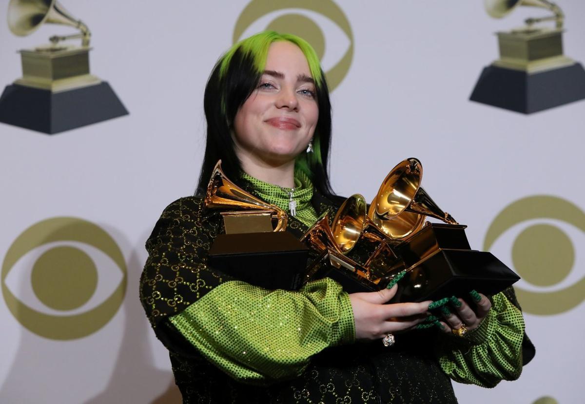 62nd Grammy Awards â Photo Roomâ Los Angeles, California, U.S., January 26, 2020 â Billie Eilish poses backstage with her awards to include Song of the Year for Bad Guy , Best New Artist, and Album of the Year for  When We All Fall Asleep, Where Do We Go?. REUTERS/Monica Almeida     TPX IMAGES OF THE DAY