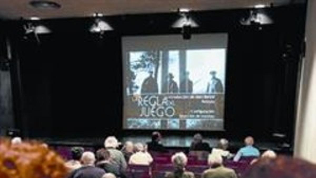 La sala 8Proyección de una película en el Centre Cívic de Les Corts.